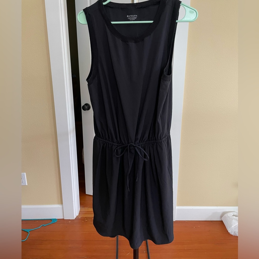 Black athleta athletic dress with cinch waist.